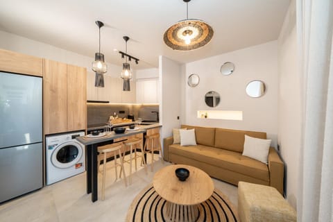 Living room, stove, washing machine, dryer, kitchen