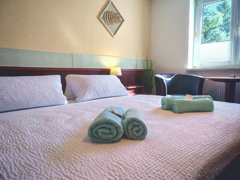 Shower, Bathroom, View (from property/room), Living room, Photo of the whole room, Seating area, Bedroom, Garden view, towels, wardrobe