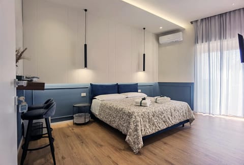 Photo of the whole room, Bedroom, towels, air conditioner