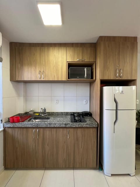 Kitchen or kitchenette, microwave, stove