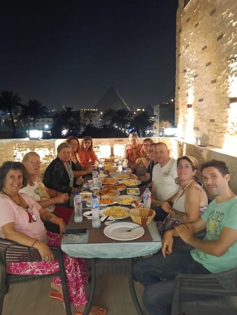 Patio, Restaurant/places to eat, Restaurant/places to eat, Night, People, BBQ facilities, View (from property/room), Balcony/Terrace, Food and drinks, Banquet/Function facilities, Dining area, Evening entertainment, Food, Guests, Mountain view, Drinks, group of guests, Family