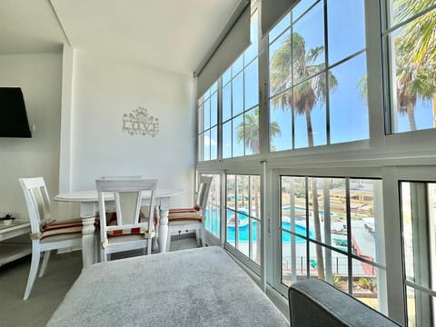 TV and multimedia, View (from property/room), Living room, Pool view