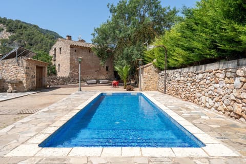 Property building, Living room, Swimming pool