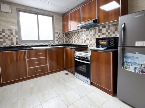 Kitchen or kitchenette, oven, stove