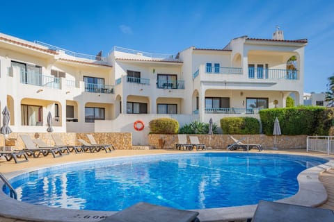 Property building, Living room, Swimming pool
