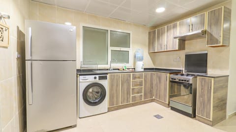 Kitchen or kitchenette, dishwasher, pet friendly, stove, toaster, washing machine