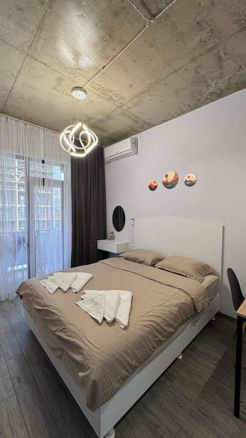 Bed, Photo of the whole room, Bedroom, towels, air conditioner
