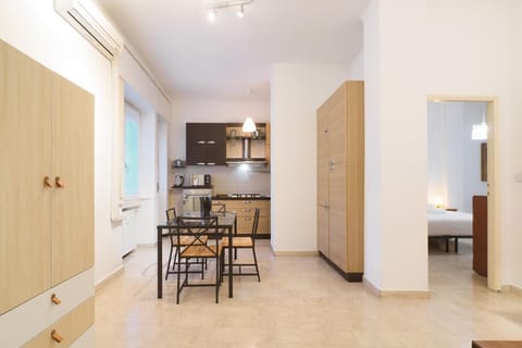 Kitchen or kitchenette, Dining area, oven, stove, wardrobe