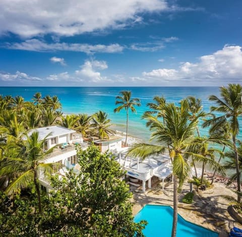 Property building, Nearby landmark, Day, Natural landscape, Beach, Pool view, Sea view, Swimming pool, sunbed