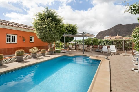 Property building, Living room, Swimming pool