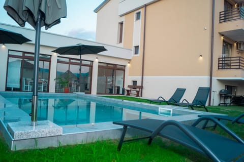 Property building, Patio, Day, Swimming pool