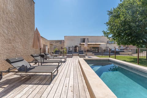 Property building, Day, Natural landscape, Pool view, Swimming pool, sunbed