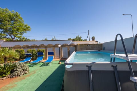 Property building, Living room, Swimming pool