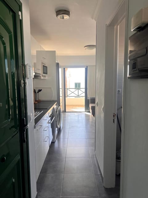 Kitchen or kitchenette, oven, stove