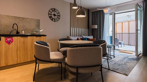 Kitchen or kitchenette, Living room, Seating area, Dining area