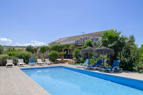 Property building, Living room, Swimming pool