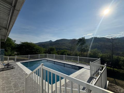 View (from property/room), Mountain view, Swimming pool, Sunrise