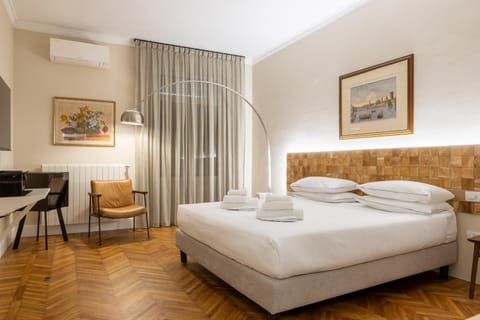 Bed, Photo of the whole room, Bedroom, towels, air conditioner