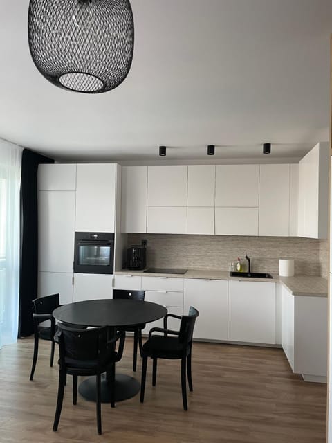 Dining area, microwave, stove, kitchen