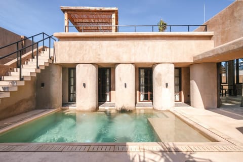 Property building, Patio, Pool view, Swimming pool