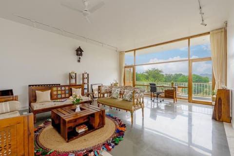 View (from property/room), Living room, Seating area, Garden view, Mountain view