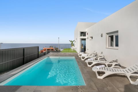 Property building, Living room, Swimming pool