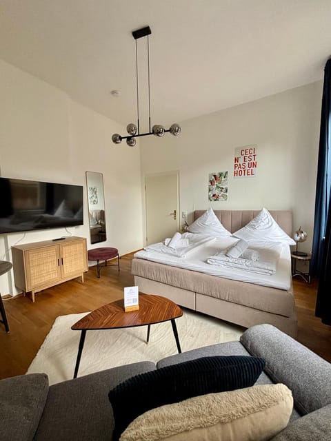 Bed, TV and multimedia, Living room, Bedroom