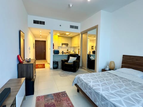 Bed, Living room, Seating area, Bedroom
