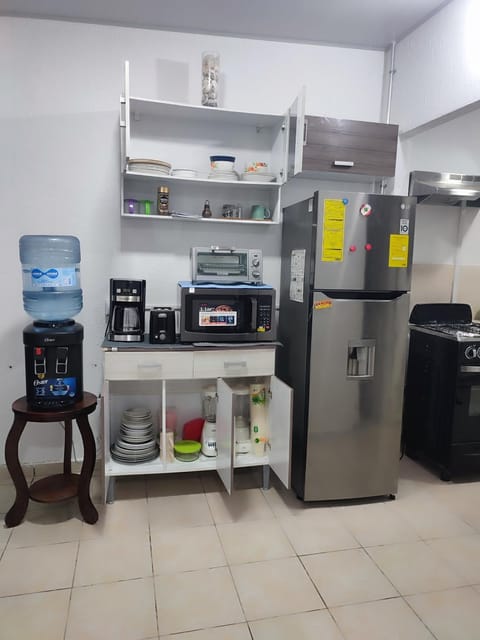 Kitchen or kitchenette, oven, toaster