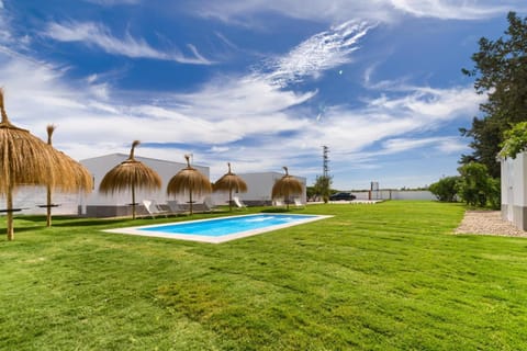 Property building, Living room, Swimming pool