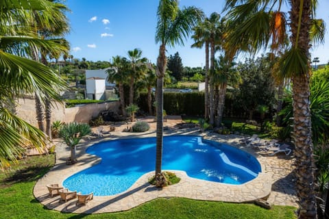 Property building, Living room, Swimming pool