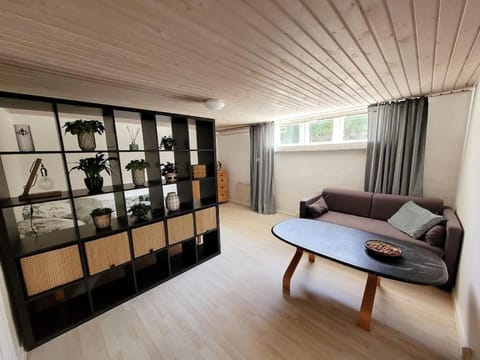 Bed, Living room, Seating area, Bedroom