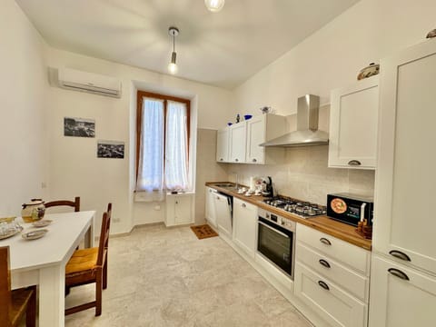 Kitchen or kitchenette, Dining area, dishwasher, microwave, oven, stove, washing machine, dryer
