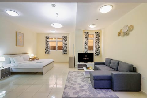 Bed, TV and multimedia, Living room, Seating area