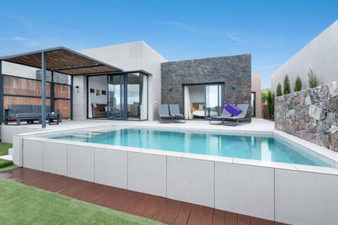Property building, Living room, Swimming pool