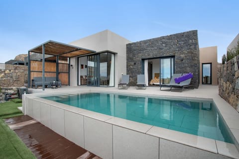Property building, Living room, Swimming pool