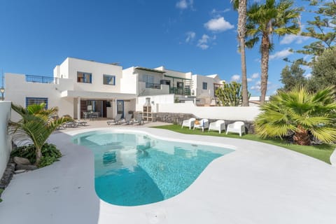 Property building, Living room, Swimming pool