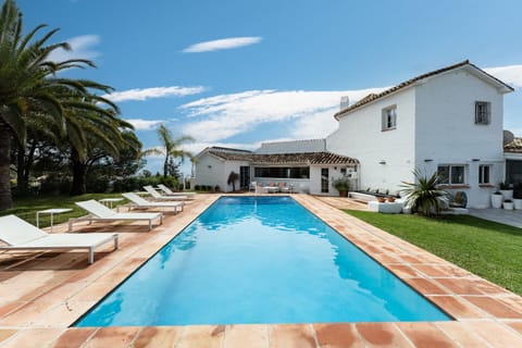 Property building, Living room, Swimming pool