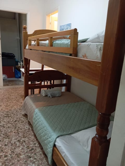 Wooden bunk bed in a dorm 5' from metro Hostel in Athens