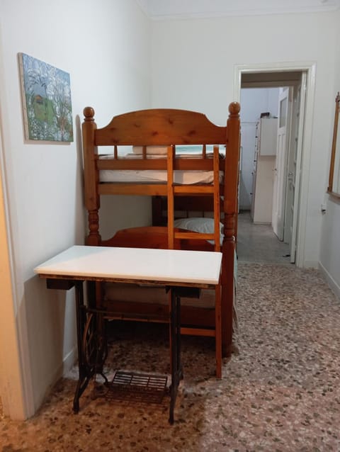 Wooden bunk bed in a dorm 5' from metro Hostel in Athens