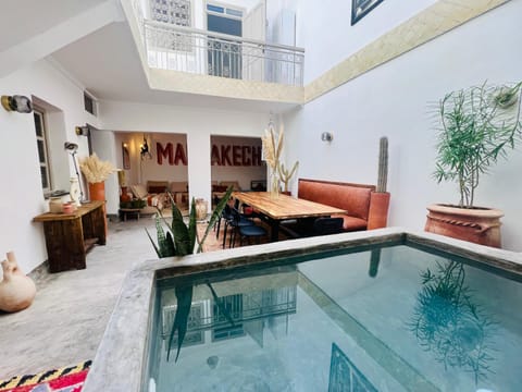Patio, Living room, Seating area, Dining area, Pool view, Swimming pool