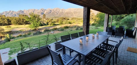 Patio, Seating area, Dining area, Mountain view, River view