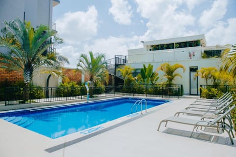 Property building, Day, Pool view, Swimming pool, Swimming pool, sunbed