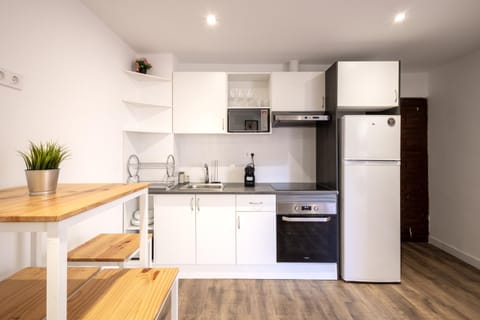 Kitchen or kitchenette, oven, stove