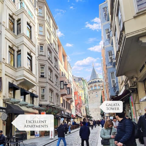 Property building, Nearby landmark, People, Neighbourhood, Logo/Certificate/Sign, Street view