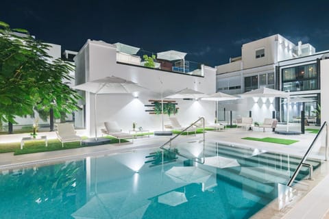 Property building, Night, Pool view, Swimming pool, sunbed