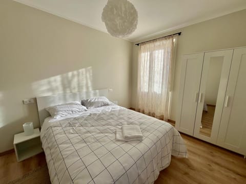 Bed, Photo of the whole room, Bedroom, towels, wardrobe