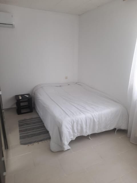 Bed, air conditioner