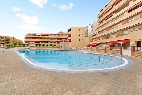 Property building, Living room, Swimming pool