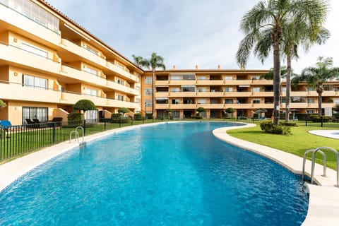 Property building, Living room, Swimming pool